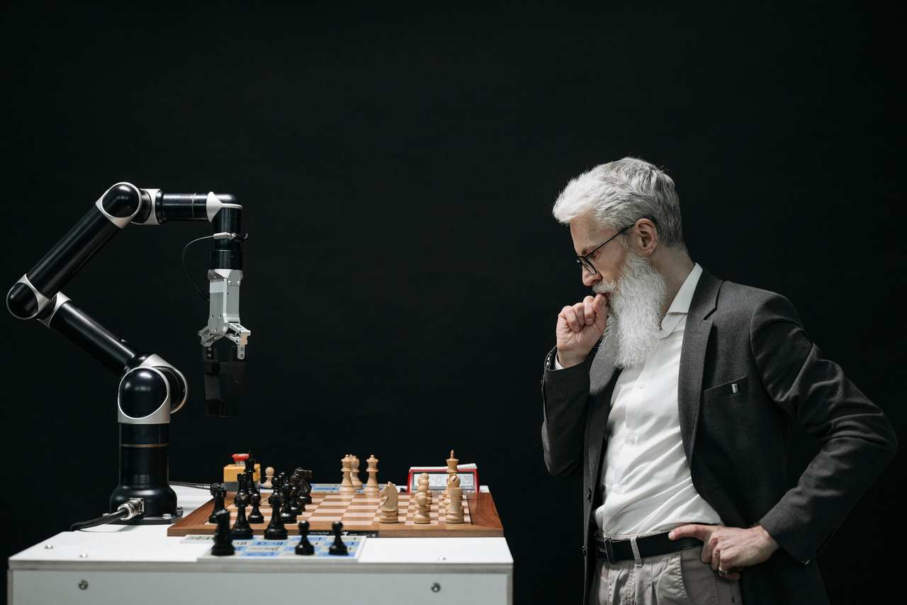 A man playing chess with AI