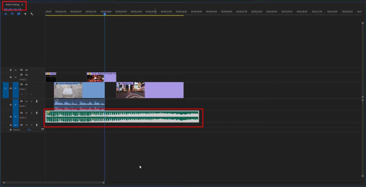 Showing how to fade audio in Premiere Pro using auto-ducking