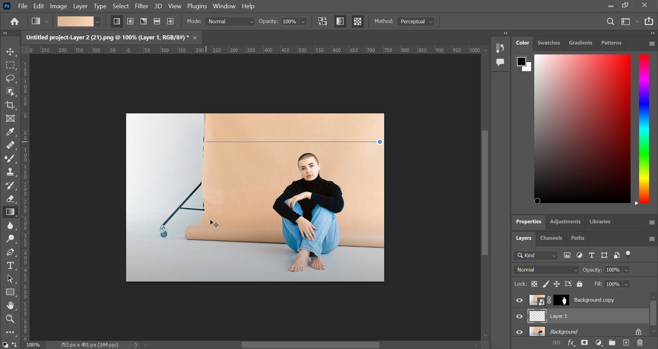 Hold the Shift key to extend the background in Photoshop